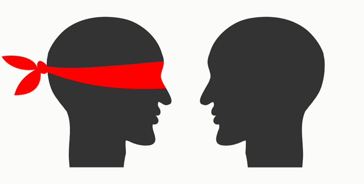 two silhouettes of heads, one with a red blindfold and one without a blindfold